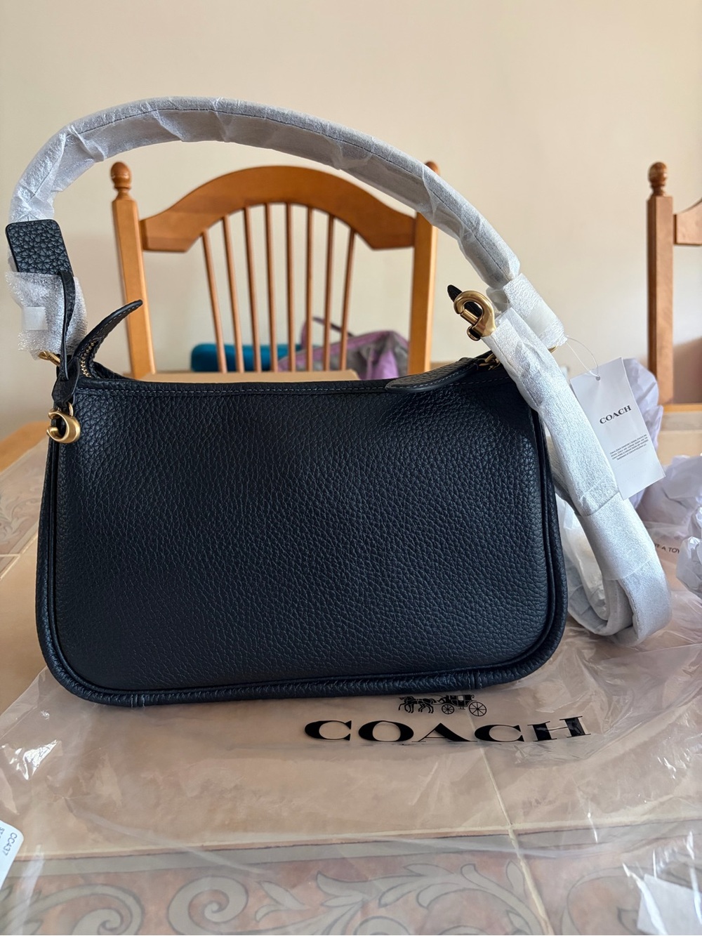 Coach Black Pebbled Leather Shoulder Bag with Gold-Tone Hardware